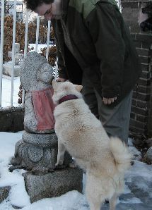 Larry and Dog pay respects